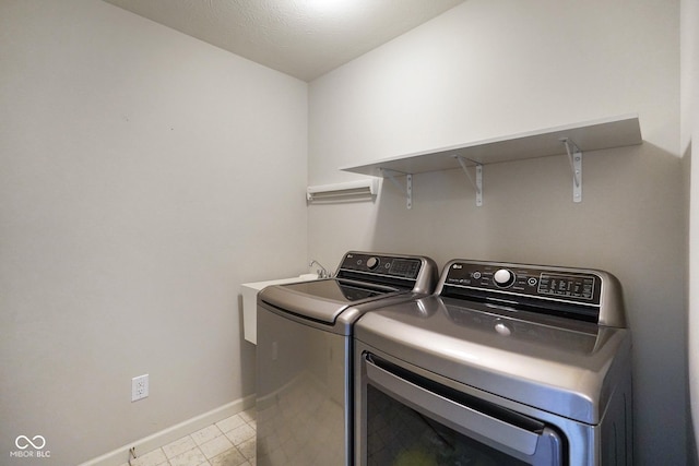 6830 Park Grove Blvd, Whitestown, IN 46075 - laundry room with baseboards and independent washer and dryer