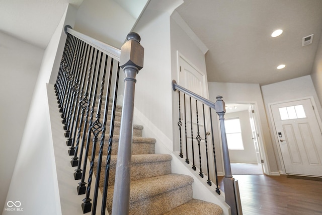 6830 Park Grove Blvd, Whitestown, IN 46075 - entryway with wood finished floors, recessed lighting, stairway, and baseboards