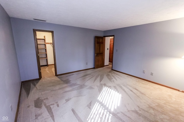 3819 S Village Dr, New Palestine, IN 46163 - unfurnished room featuring light carpet and baseboards