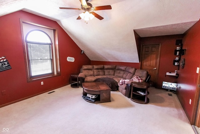 3819 S Village Dr, New Palestine, IN 46163 - carpeted living room featuring lofted ceiling, a ceiling fan, and baseboards