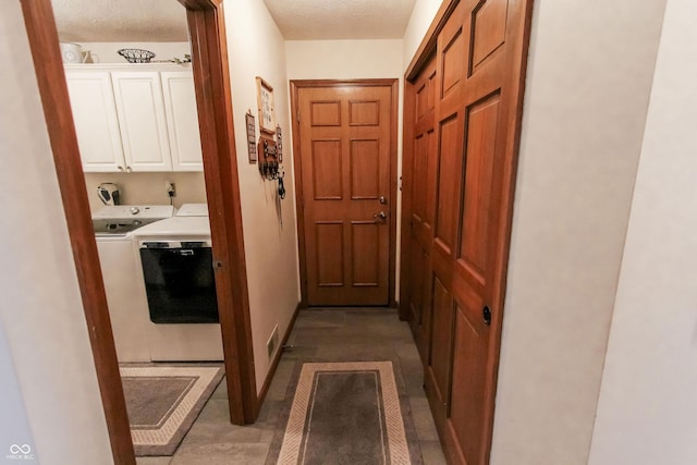 3819 S Village Dr, New Palestine, IN 46163 - hallway with washer and dryer and a textured ceiling