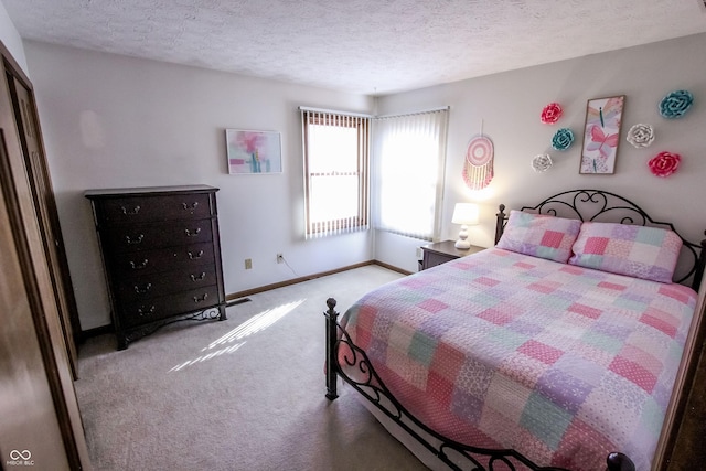 3819 S Village Dr, New Palestine, IN 46163 - carpeted bedroom with baseboards and a textured ceiling