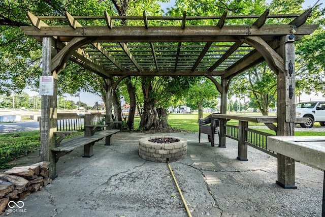 262 W Ray St, Indianapolis, IN 46225 - view of home's community featuring a fire pit, a pergola, and a patio area