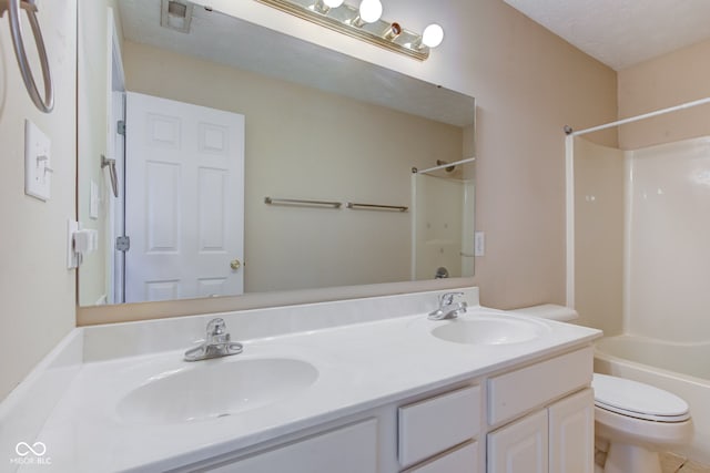 2234 Burgundy Way, Plainfield, IN 46168 - bathroom featuring double vanity, shower / washtub combination, and toilet