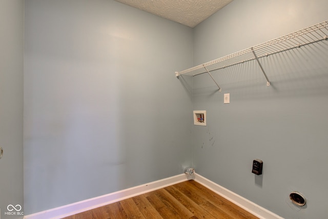 2234 Burgundy Way, Plainfield, IN 46168 - laundry room featuring baseboards, hookup for a washing machine, and wood finished floors