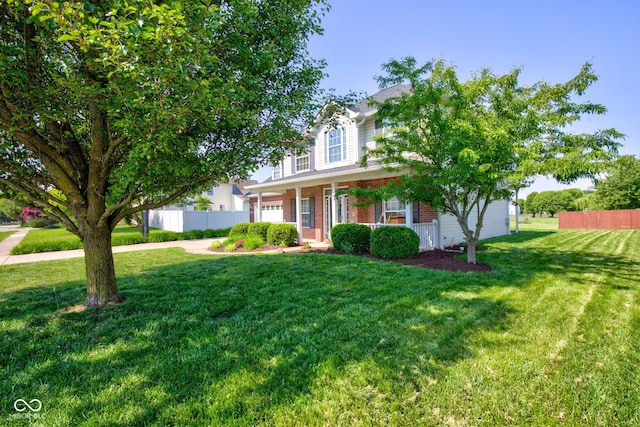 2234 Burgundy Way, Plainfield, IN 46168 - view of front facade featuring brick siding, a porch, and a garage