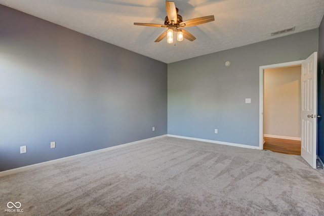 2234 Burgundy Way, Plainfield, IN 46168 - empty room featuring carpet floors, ceiling fan, baseboards, and a textured ceiling
