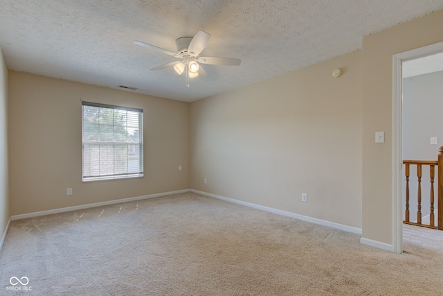 2234 Burgundy Way, Plainfield, IN 46168 - spare room with ceiling fan, light colored carpet, a textured ceiling, and baseboards