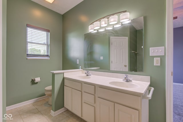 2234 Burgundy Way, Plainfield, IN 46168 - full bath with toilet, double vanity, baseboards, and tile patterned flooring