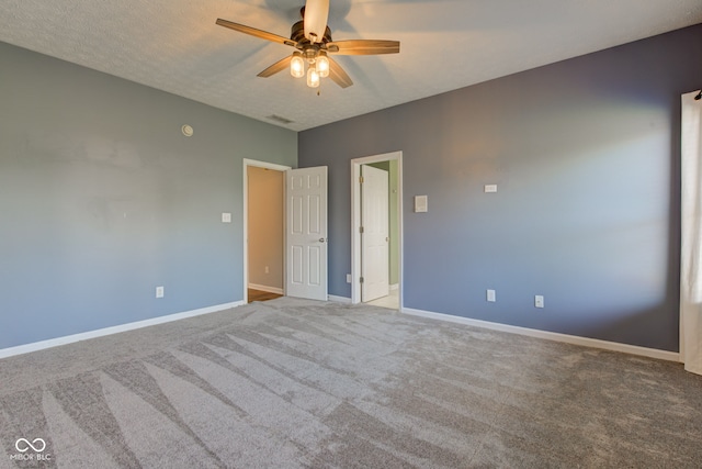 2234 Burgundy Way, Plainfield, IN 46168 - spare room featuring ceiling fan, carpet flooring, and baseboards