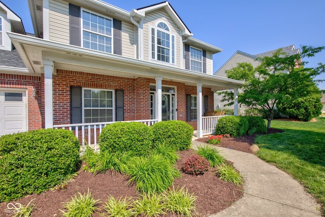 2234 Burgundy Way, Plainfield, IN 46168 - view of front of home featuring covered porch and brick siding