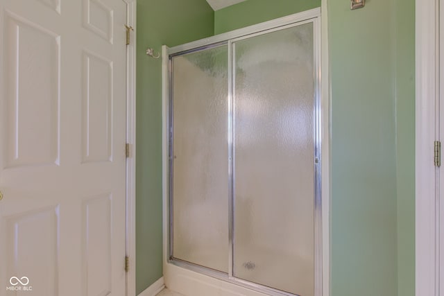 2234 Burgundy Way, Plainfield, IN 46168 - full bathroom featuring a shower stall and baseboards