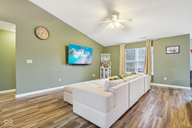 2114 Turning Leaf Dr, Franklin, IN 46131 - living room with a ceiling fan, lofted ceiling, wood finished floors, and baseboards