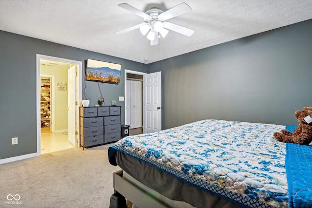 2114 Turning Leaf Dr, Franklin, IN 46131 - bedroom featuring carpet floors, baseboards, a ceiling fan, and connected bathroom