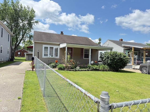 4853 Wentworth Blvd, Indianapolis, IN 46201 - bungalow-style house with driveway and a chimney