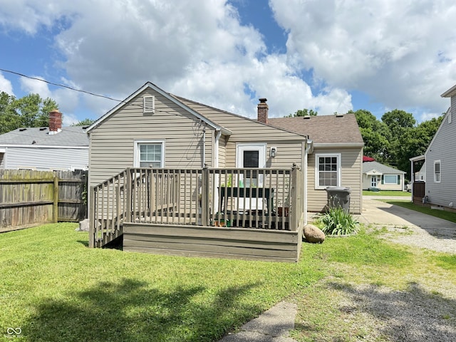 4853 Wentworth Blvd, Indianapolis, IN 46201 - back of house featuring a deck and a chimney