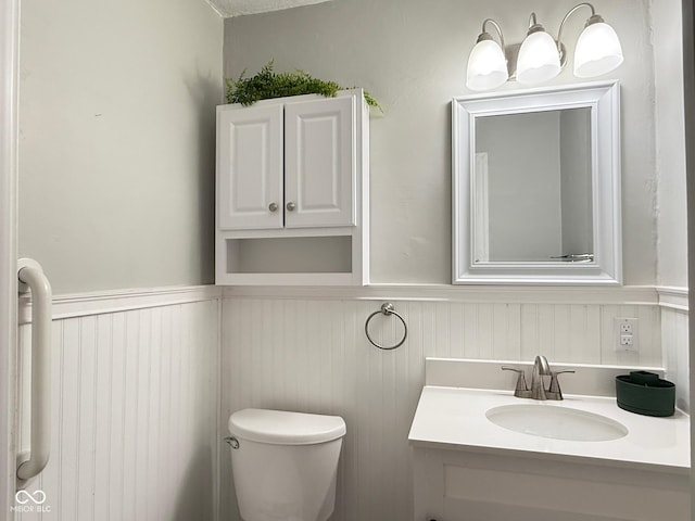 4853 Wentworth Blvd, Indianapolis, IN 46201 - half bathroom with a wainscoted wall and vanity