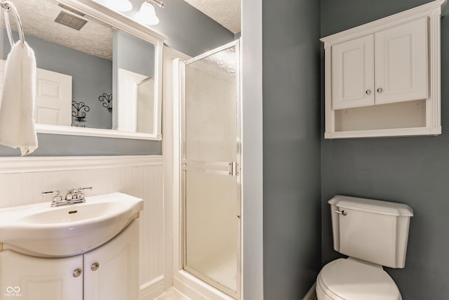 7935 N County Road 650 E, Brownsburg, IN 46112 - full bath with a shower stall, a wainscoted wall, vanity, and a textured ceiling