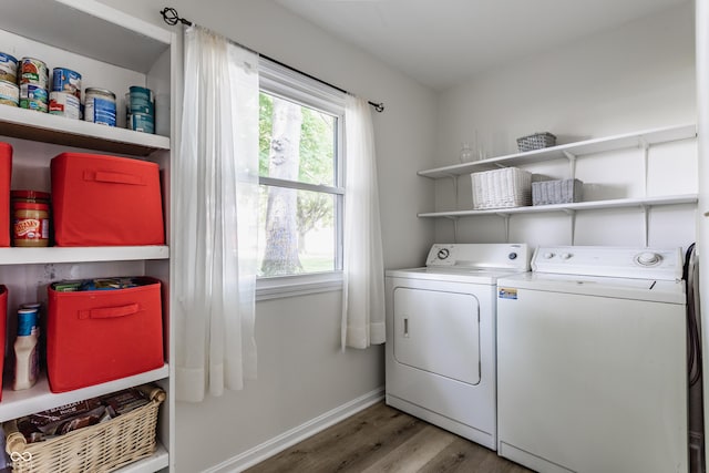 7935 N County Road 650 E, Brownsburg, IN 46112 - laundry room with separate washer and dryer and wood finished floors