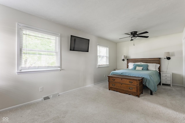 7935 N County Road 650 E, Brownsburg, IN 46112 - carpeted bedroom with baseboards and ceiling fan