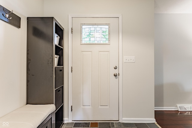 7935 N County Road 650 E, Brownsburg, IN 46112 - mudroom with baseboards and dark wood-type flooring