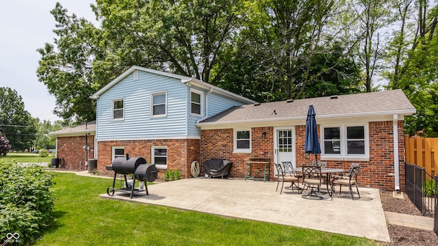 7935 N County Road 650 E, Brownsburg, IN 46112 - rear view of house featuring a patio area and brick siding