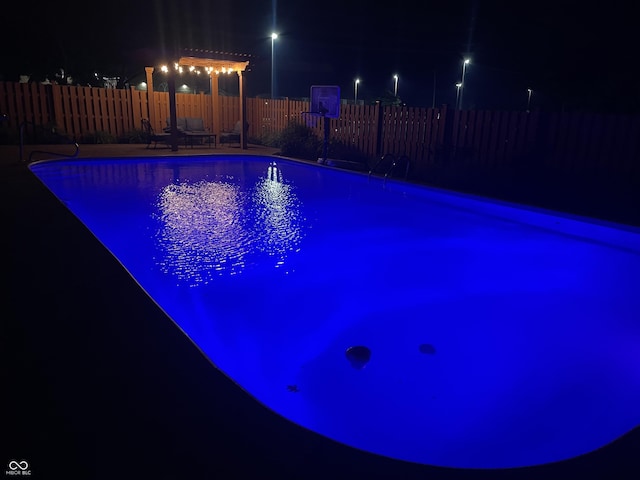 7935 N County Road 650 E, Brownsburg, IN 46112 - pool at twilight featuring a patio area