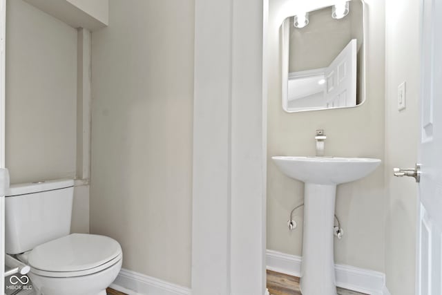 2111 S A St, Elwood, IN 46036 - half bath featuring toilet and baseboards