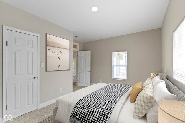 2111 S A St, Elwood, IN 46036 - bedroom with light carpet, multiple windows, baseboards, and recessed lighting