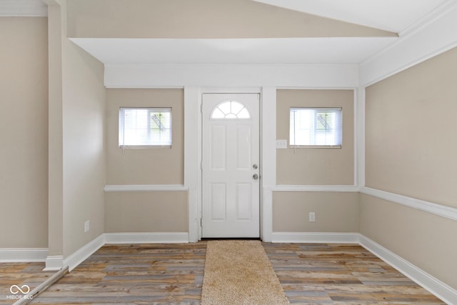 2111 S A St, Elwood, IN 46036 - foyer entrance with wood finished floors, plenty of natural light, baseboards, and vaulted ceiling