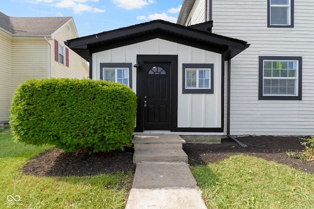 2111 S A St, Elwood, IN 46036 - view of exterior entry featuring board and batten siding