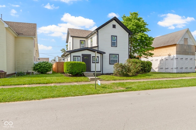 2111 S A St, Elwood, IN 46036 - view of front of house featuring an outdoor structure and an attached garage