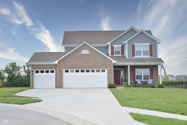 925 Bent Branch Cir, Greenwood, IN 46143 - view of front of property featuring a garage, driveway, a front yard, and brick siding