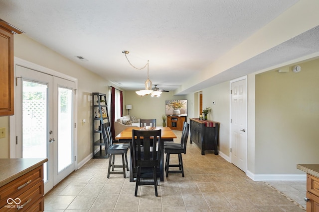 101 Meadowview Dr, Mooresville, IN 46158 - dining area featuring baseboards, a chandelier, french doors, and light tile patterned floors