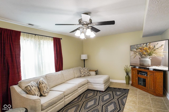 101 Meadowview Dr, Mooresville, IN 46158 - living room with a ceiling fan, light tile patterned floors, and baseboards