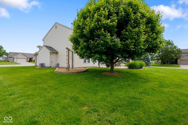 101 Meadowview Dr, Mooresville, IN 46158 - view of side of home featuring central air condition unit and a lawn