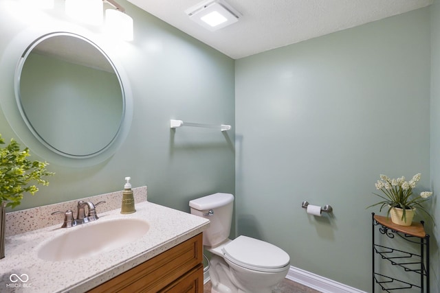 101 Meadowview Dr, Mooresville, IN 46158 - half bath featuring toilet, vanity, baseboards, and a textured ceiling