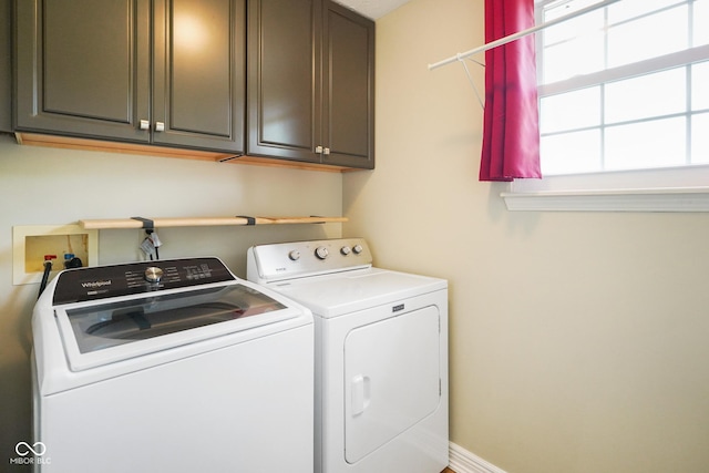 101 Meadowview Dr, Mooresville, IN 46158 - laundry room with washing machine and clothes dryer, cabinet space, and baseboards
