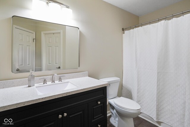 101 Meadowview Dr, Mooresville, IN 46158 - full bathroom featuring toilet, vanity, and a shower with shower curtain