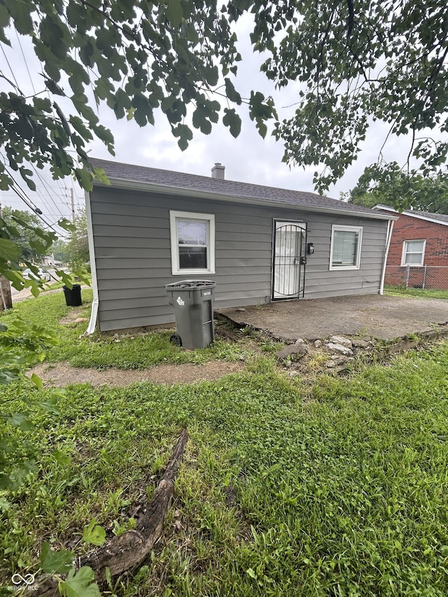 3202 N Emerson Ave, Indianapolis, IN 46218 - back of property with a patio area