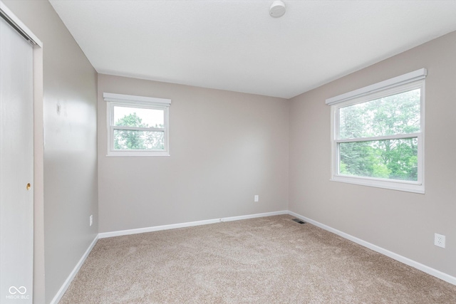 8205 Picadilly Ln, Indianapolis, IN 46256 - unfurnished bedroom featuring carpet flooring, baseboards, and a closet