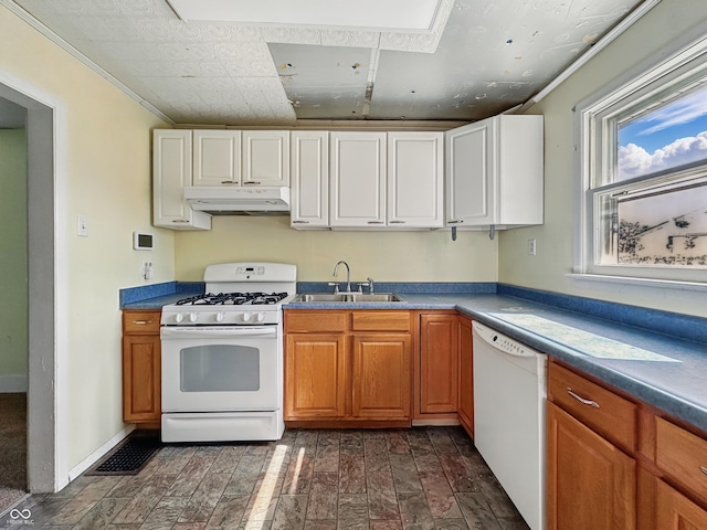 621 N Livingston Ave, Indianapolis, IN 46222 - kitchen featuring white appliances, a sink, under cabinet range hood, crown molding, and white cabinetry