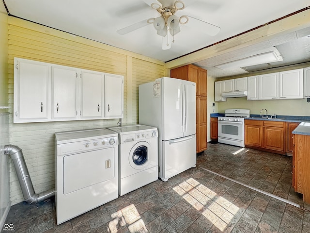621 N Livingston Ave, Indianapolis, IN 46222 - washroom featuring washing machine and dryer, stone finish floors, wooden walls, and a ceiling fan