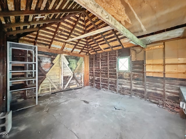 621 N Livingston Ave, Indianapolis, IN 46222 - miscellaneous room with lofted ceiling and concrete flooring