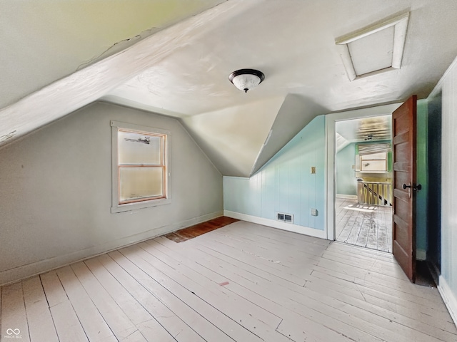 621 N Livingston Ave, Indianapolis, IN 46222 - bonus room with attic access, hardwood / wood-style floors, baseboards, and lofted ceiling