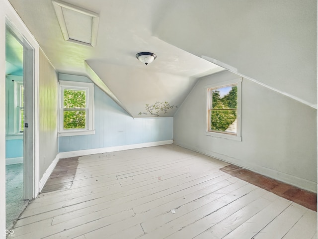 621 N Livingston Ave, Indianapolis, IN 46222 - bonus room with wood-type flooring, vaulted ceiling, and baseboards
