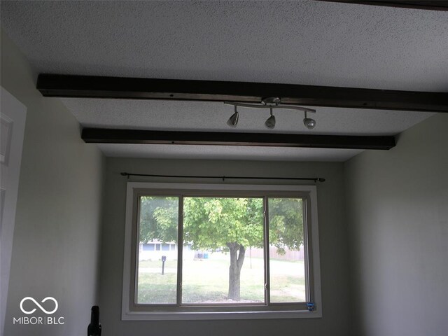 3456 S Sadlier Dr S, Indianapolis, IN 46239 - detailed view of beam ceiling and a textured ceiling