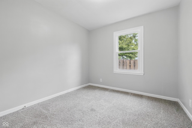 450 N Fenton Ave, Indianapolis, IN 46219 - carpeted empty room featuring baseboards