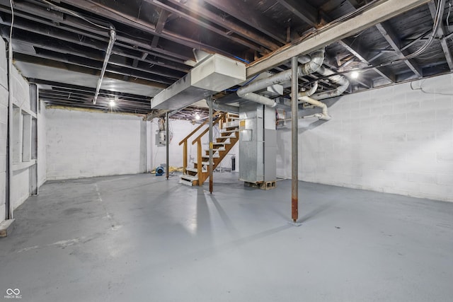 450 N Fenton Ave, Indianapolis, IN 46219 - unfinished below grade area with stairs and heating unit