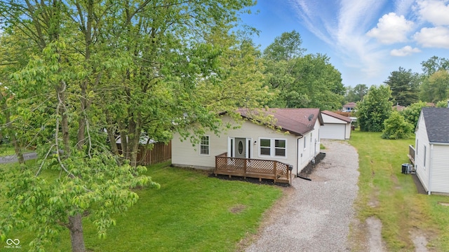 450 N Fenton Ave, Indianapolis, IN 46219 - view of front facade featuring a deck and a garage